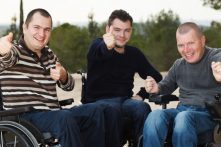 Happy friends with thumbs up.