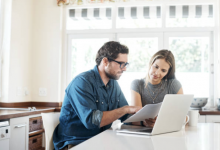 2 people working on a budget