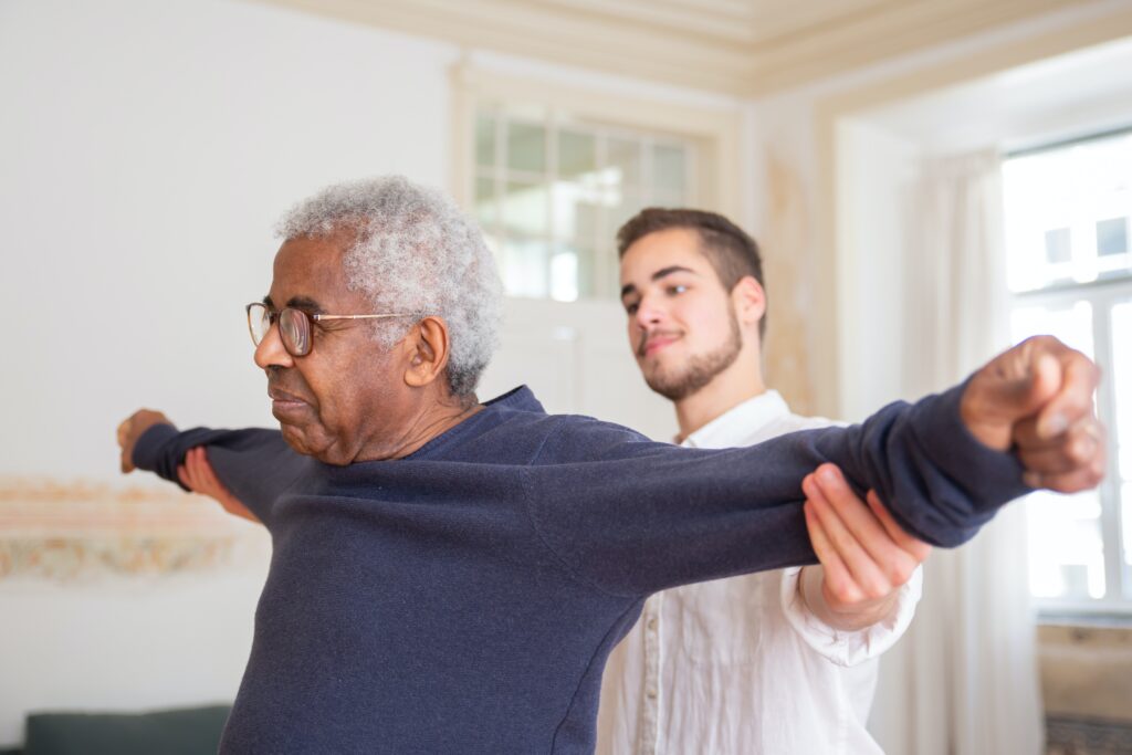 An older Australian works with an occupational therapist.