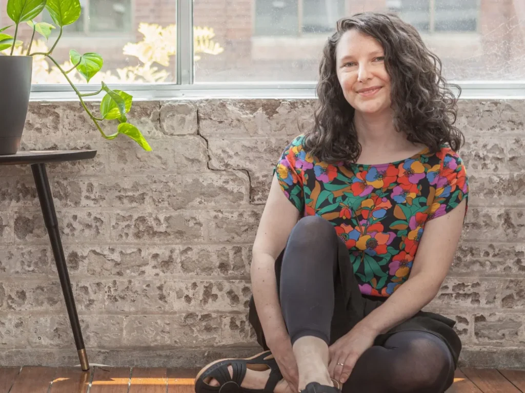 Author Jess Horn sitting down